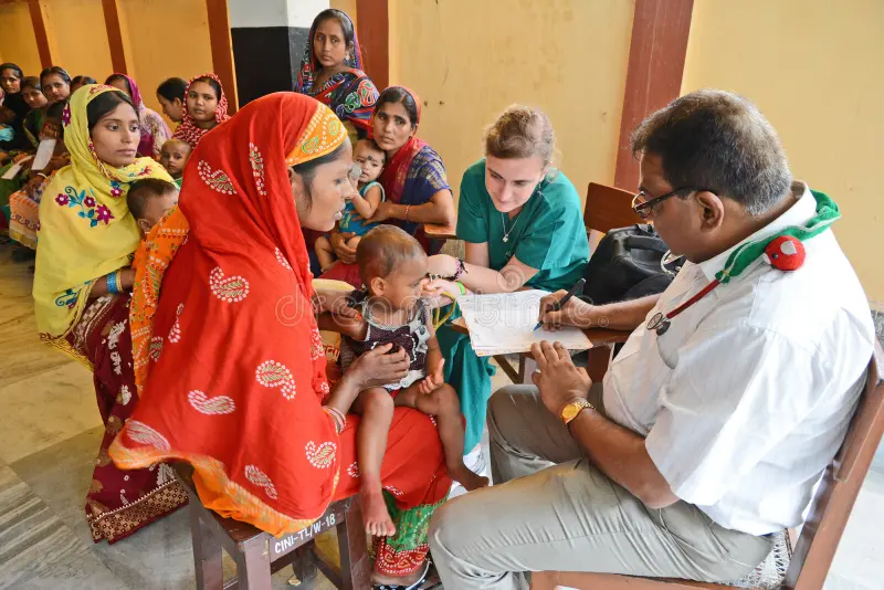 ngo activity doctor examine child health clinic center which organized half india s children under age 63979746 copy
